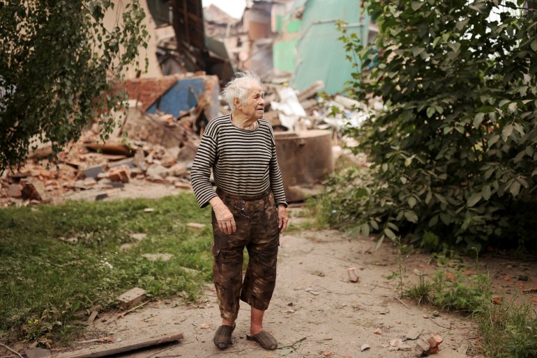 Vladimir, 93, outside the Central House of Culture after the missile attack. Credit: [Nacho Doce/Reuters]