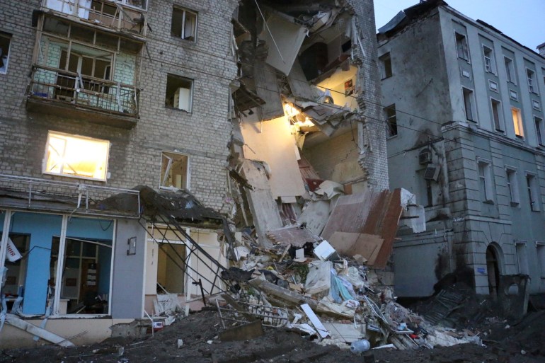 Residential buildings damaged by a missile strike in Kharkiv