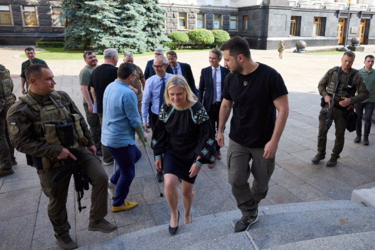 Ukrainian President Volodymyr Zelenskyy greets Swedish Prime Minister Magdalena Andersson in Kyiv, Ukraine.