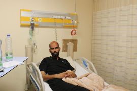 Mohammad Fathi Attato, survivor of the Aqaba port leak, lies in a hospital bed