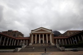 Students walk across a plaza in front of the University of Cape Town in Cape Town, South Africa, November 13, 2017