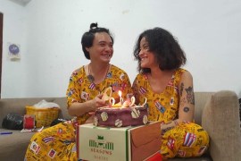 Thazin and Zeyar celebrate with a cake for Thazin's birthday on July 29, 2021.