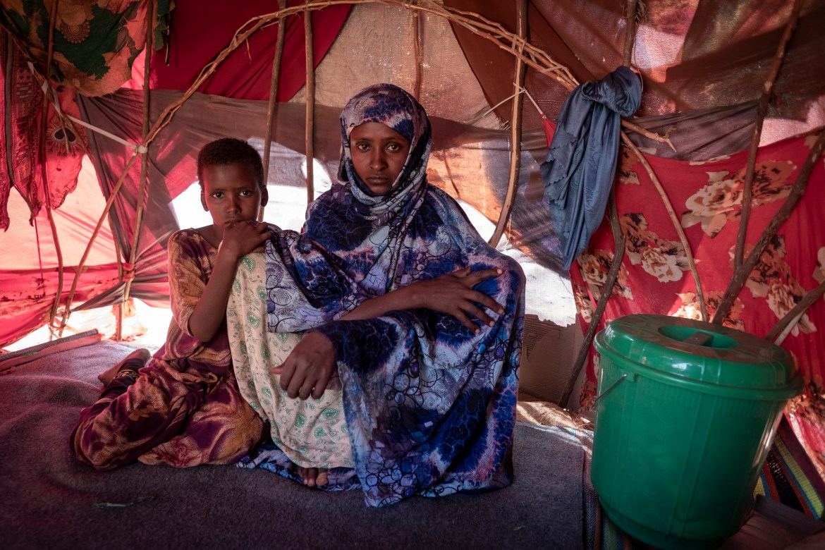 Fatuma Mohamed aged 30 with her daughter Naney Adam Abdi aged 8 yrs have been in the makeshift IDP camp in Dollow, Somalia