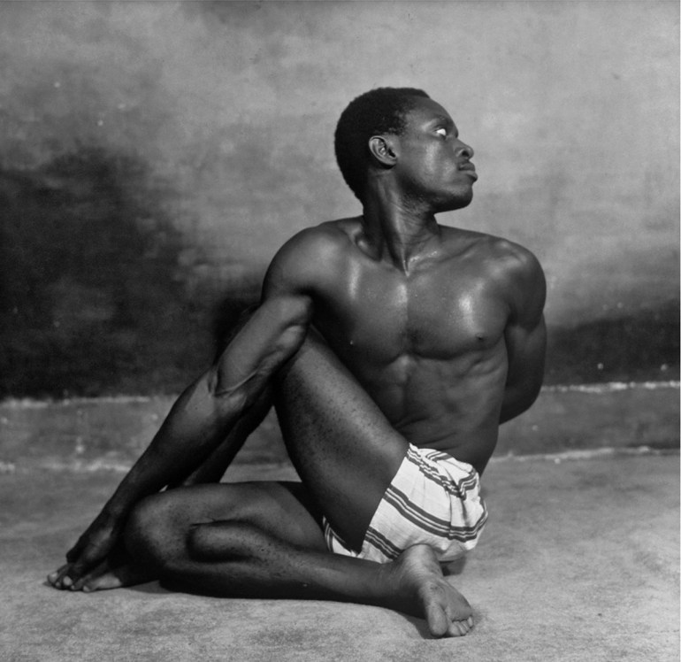 A man in a yoga pose
