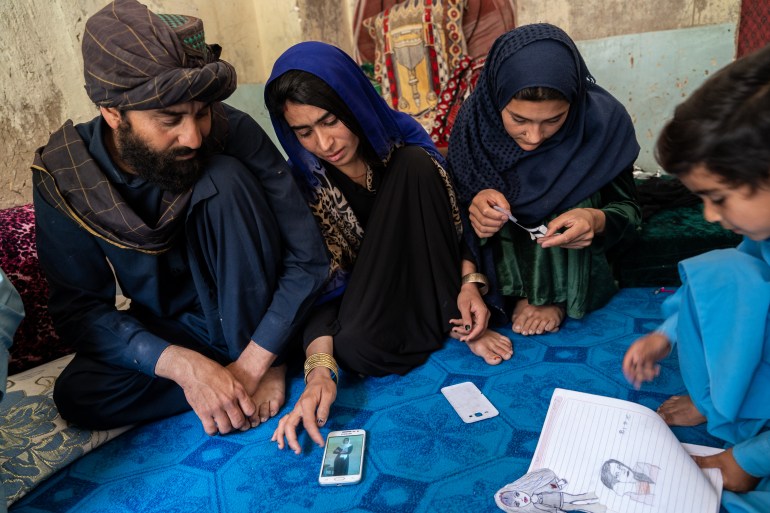 An Afghan family grieving the death of their teenage daughter who was murdered
