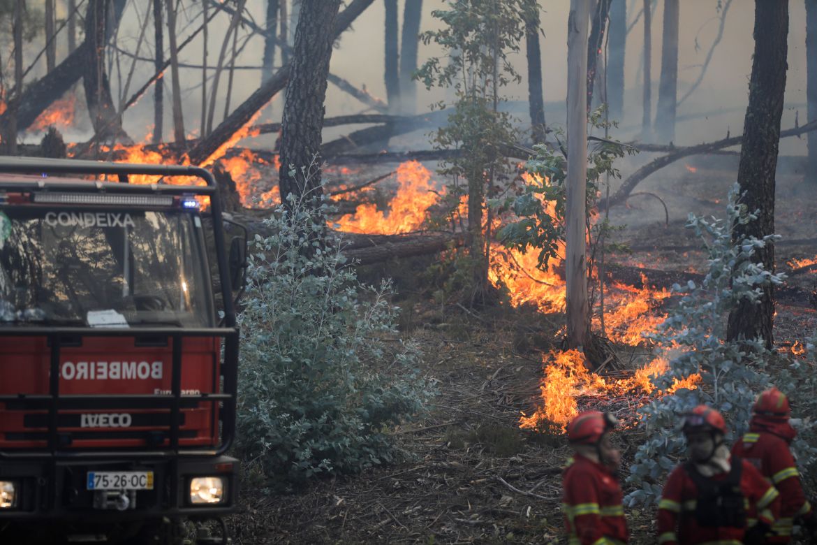 Firefighter battling a fire in Cruzinha, Alvaiazere, Portugal
