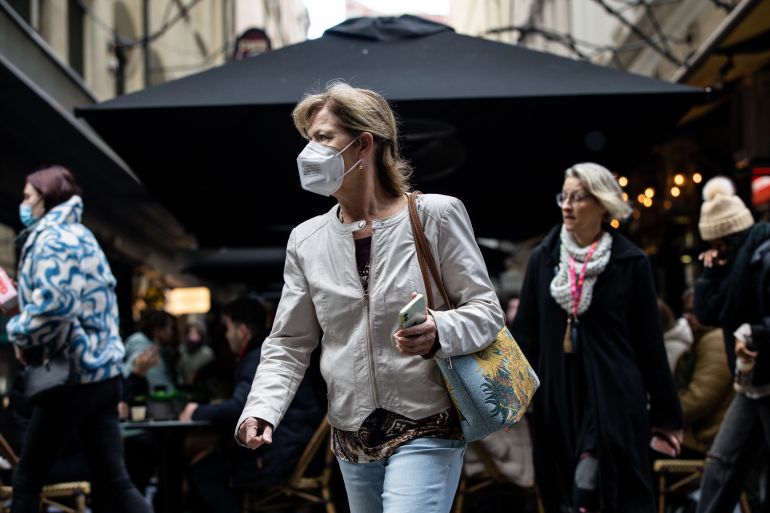 A women wearing an N95 mask on a street in Melbourne, Australia.