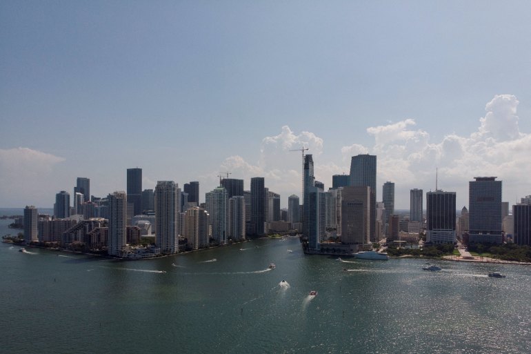 The Miami River flows into Biscayne Bay between the Brickell neighborhood and downtown, in Miami, Florida, USA