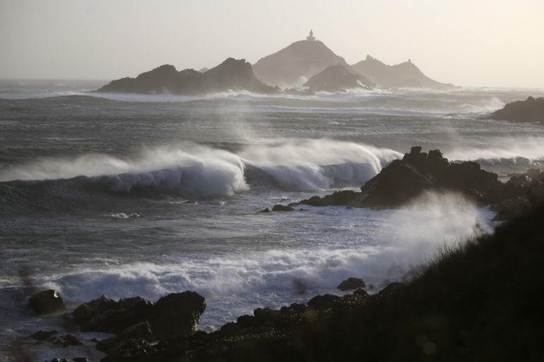 The Iles Sanguinaires' lighthouse, along the coast from Ajaccio, is pictured as strong winds and waves hit the coast during Storm Franklin , on the French Mediteranean island of Corsica
