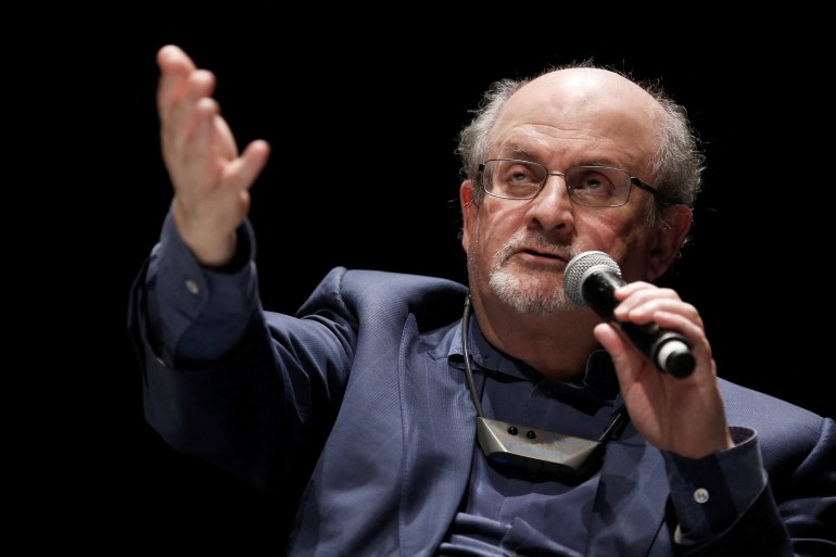 In this file photo taken on September 13, 2016, British writer Salman Rushdie speaks during the opening day of the Positive Economy Forum in Le Havre, northwestern France.