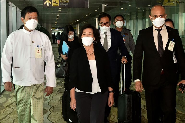 United Nations Special Envoy on Myanmar Noeleen Heyzer walking with high-level officials following her arrival at the airport in Yangon, Myanmar.