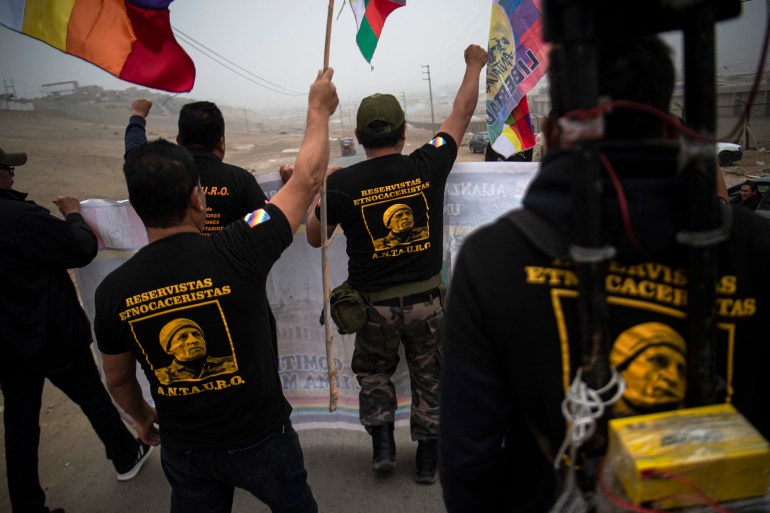 Supporters of Humala and the ethnocacerista movement stand outside a prison in Lima, Peru.