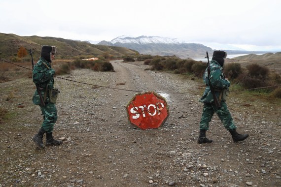 Azeri soldiers are seen guarding a road