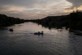 Smugglers use rafts to transport families from Central and South America across the Rio Grande river into the United States from Mexico in Roma Creek, Texas on July 14, 2022 [Adrees Latif/Reuters]