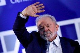 Brazilian presidential frontrunner Luiz Inacio Lula da Silva has called on people to elect him to &#39;transform and rebuild Brazil&#39; and defeat a &#39;totalitarian threat&#39; [File: Adriano Machado/Reuters]
