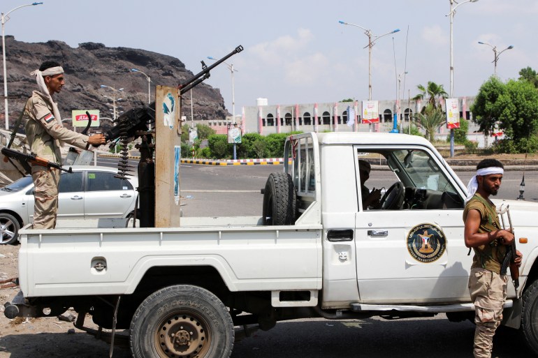 Members of the separatist Southern Transitional Council (STC) man a checkpoint in Aden, Yemen,