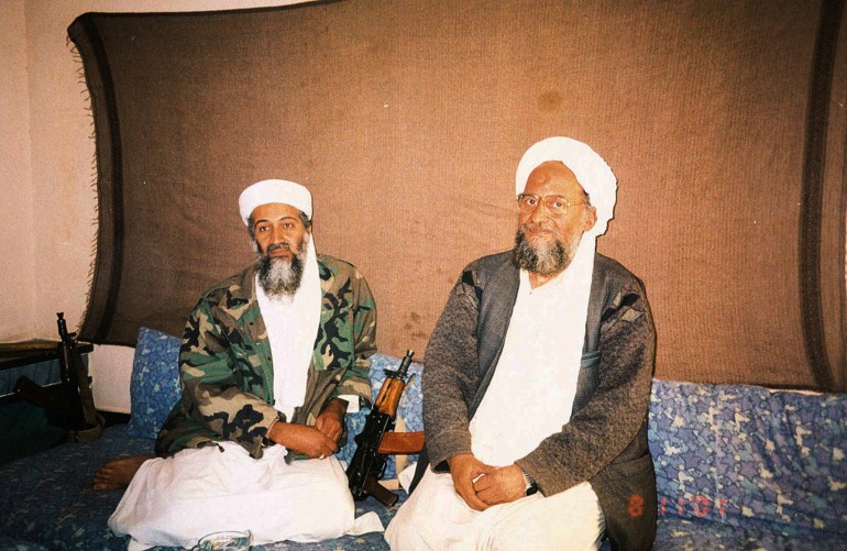 Osama bin Laden sits with his adviser Ayman al-Zawahiri.