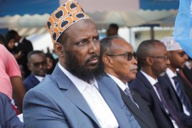 Former al Shabaab group co-founder and spokesperson Mukhtar Robow sits among colleagues after he was named as the minister in charge of religion by Prime Minister Hamza Abdi Barre in Mogadishu, Somalia August 2, 2022. REUTERS/Feisal Omar