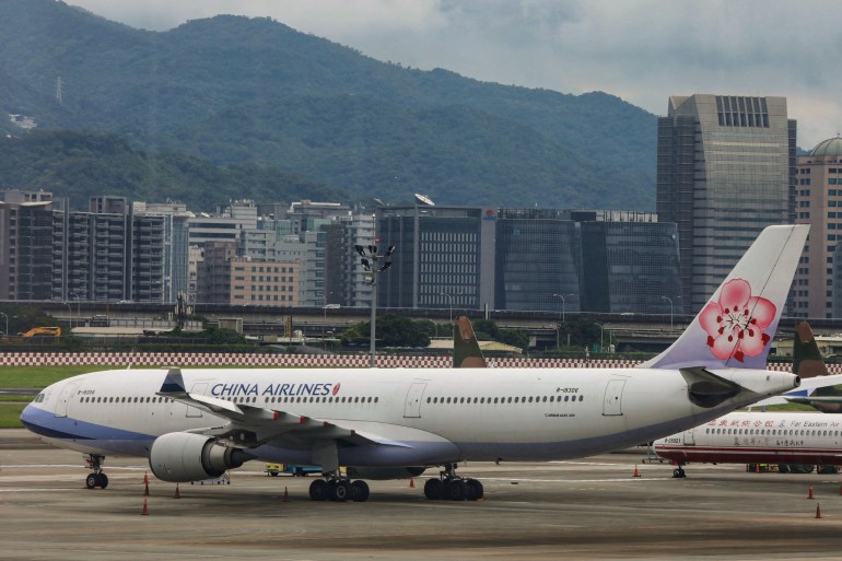 A China Airlines plane on a tarmac.