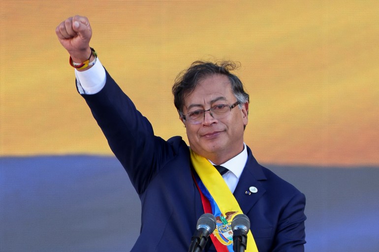 Gustavo Petro gestures during his swearing-in ceremony at Plaza Bolivar, in Bogota, Colombia.