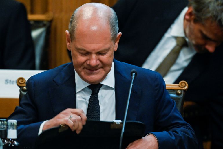 Germany's Chancellor Olaf Scholz attends a session to answer parliamentarians' questions on Cum-Ex affair, at the plenary hall in the town hall, in Hamburg
