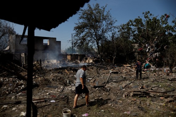 A Ukrainian man checks his destroyed house after a Russian raid in the city of Sloviansk, in eastern Ukraine.