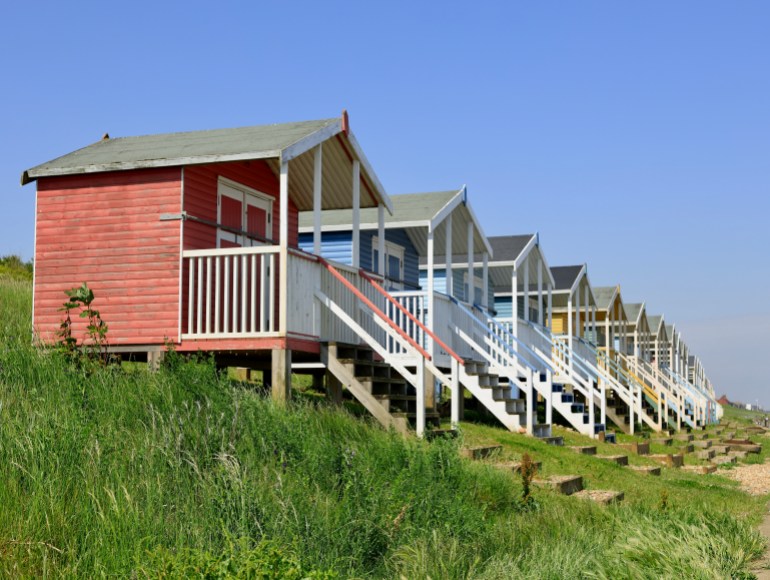 Colorful beach huts on Minster on Sea's beach.