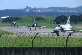 Taiwan Air Force Mirage fighter jets taxi on a runway at an airbase in Hsinchu, Taiwan, August 5, 2022 [File: Johnson Lai/AP Photo]