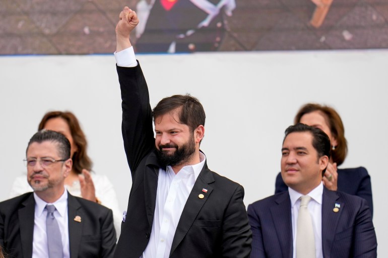 Chilean President Gabriel Boric salutes during the swearing-in ceremony for new Colombian President Gustavo Petro in Bogota, Colombia, Sunday.