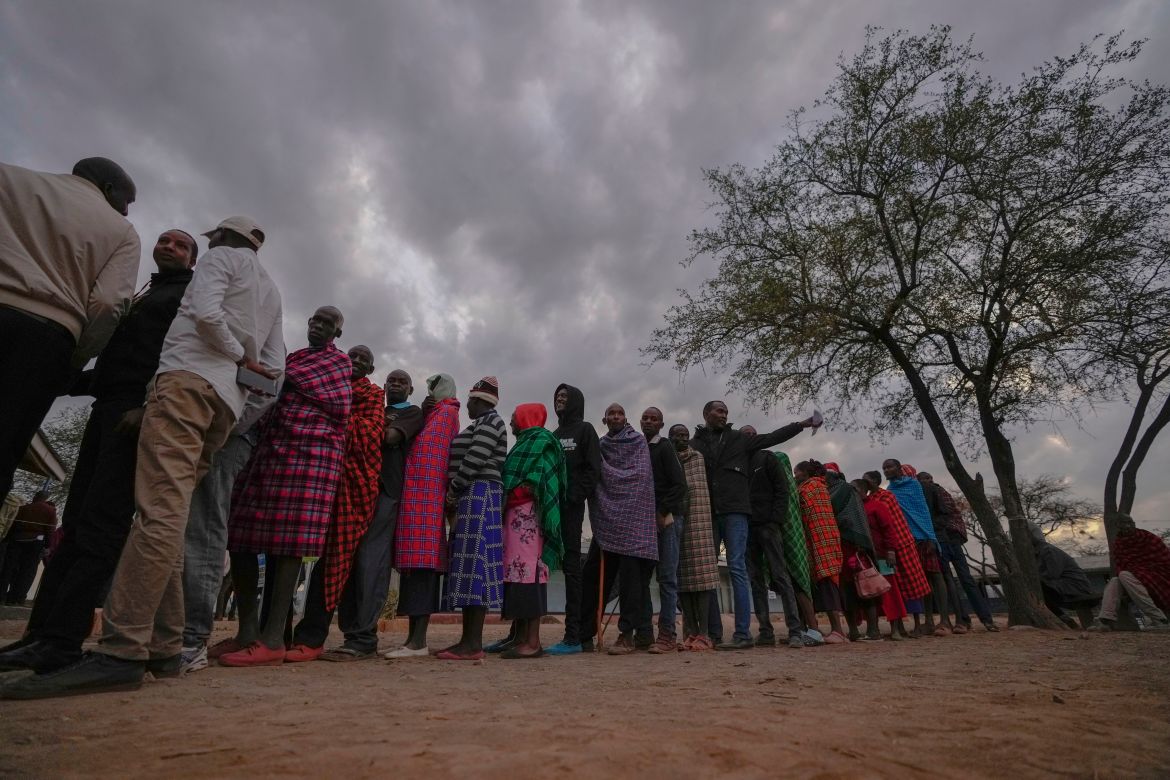 People line up to vote at the Oltepesi Primary School in Kajiado County, Nairobi, Kenya
