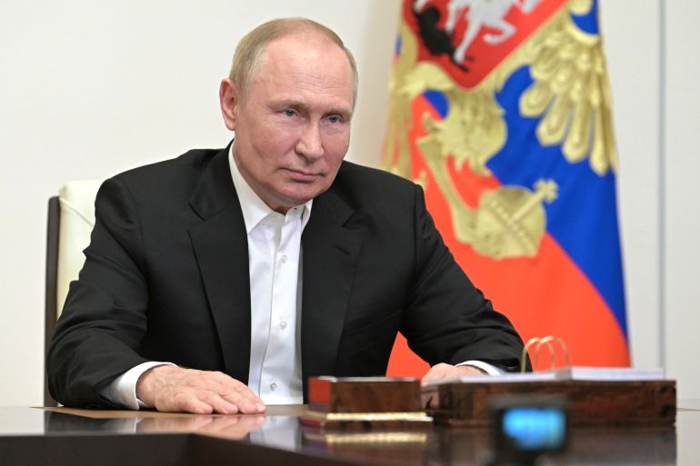 Russian President Vladimir Putin addresses a conference in Moscow.