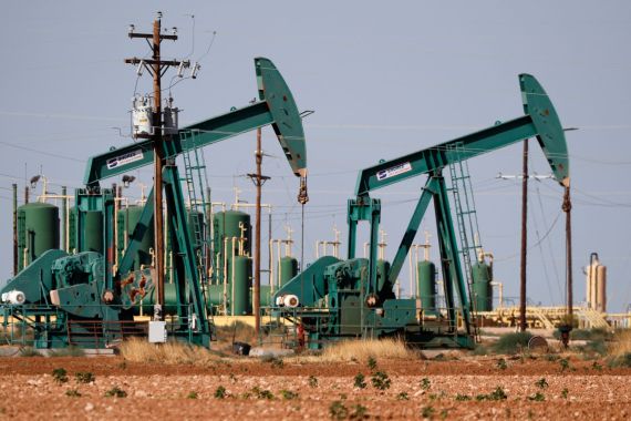 A pump jack operateing in an oil field