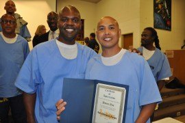 Former inmate Phoeun You (right) during a ceremony in California