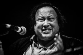 Nusrat Fateh Ali Khan at the WOMAD festival in Reading, UK [File: David Levenson/Getty Images]
