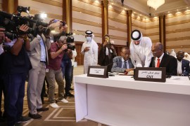 Under the accord, signed in the Qatari capital Doha, talks aimed at paving the way for a presidential election will start on August 20 [Ibraheem al-Omari/Reuters]
