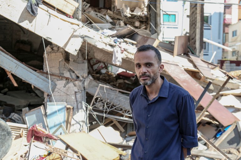 Yasser Awadallah at his destroy workshop in Gaza [Abdelhakim Abu Riash/Al Jazeera]
