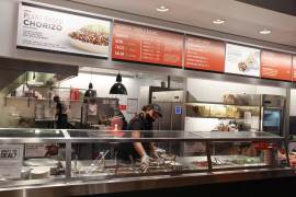 A person works in a Chipotle outlet in Manhattan, New York City, US.