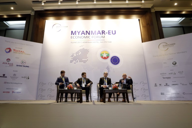 Sean Turnell on the stage with other speakers at an EU-Myanmar summit in 2017 when he was adviser to Aung San Suu Kyi