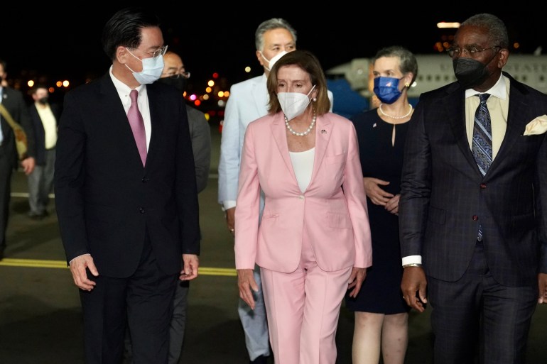 Nancy Pelosi being greeted by Taiwan Foreign Minister Joseph Wu as she arrives in Taipei, Taiwan.