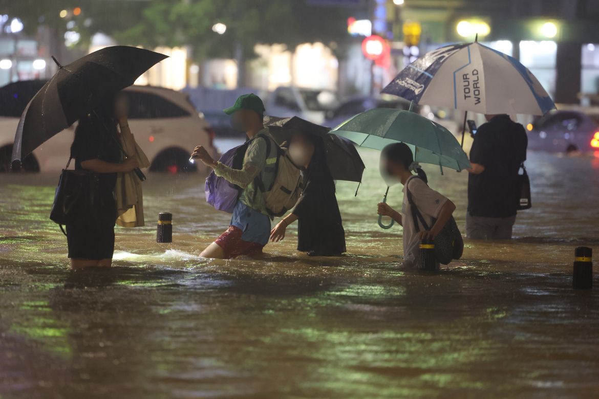Photos: Eight dead after heavy rains cause major floods in Seoul ...