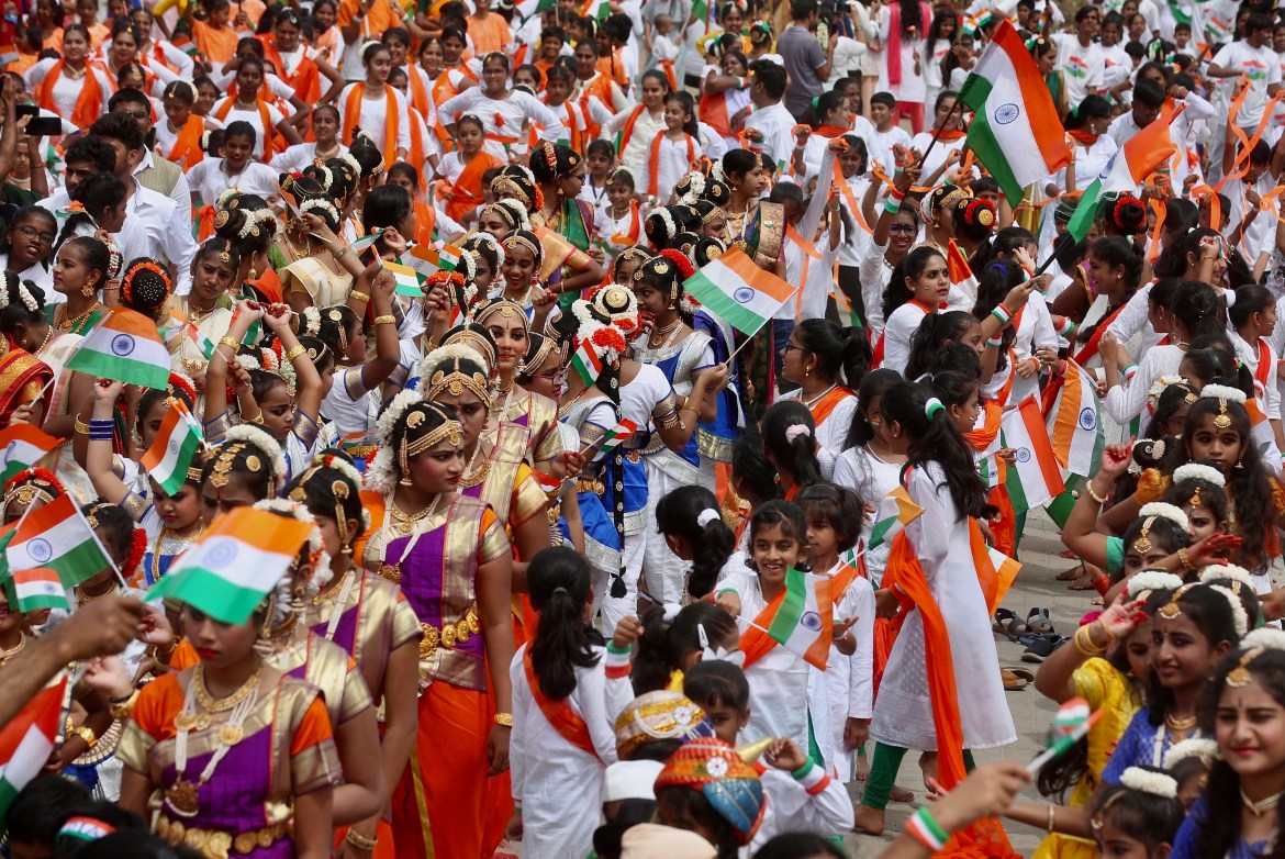 School children colourfully attired as they take part in the cultural event on the eve of 75th years of India