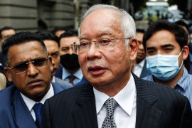 Malaysia's former prime minister Najib Razak (C) speaks to his supporters during a break in his final appeal trial outside the Federal Court in Putrajaya, Malaysia.