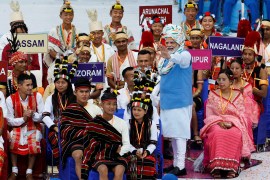 Indian Prime Minister Narendra Modi meets with folk artists after addressing the nation during Independence Day celebrations at the historic Red Fort in Delhi, India, August 15, 2022 [Adnan Abidi/Reuters]
