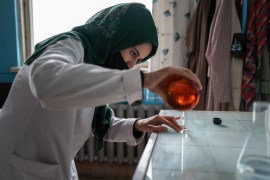 Women working as lab technicians in a factory in northern Afghanistan support their families as the country&#39;s economic crisis deepens [Kern Hendricks/Al Jazeera]