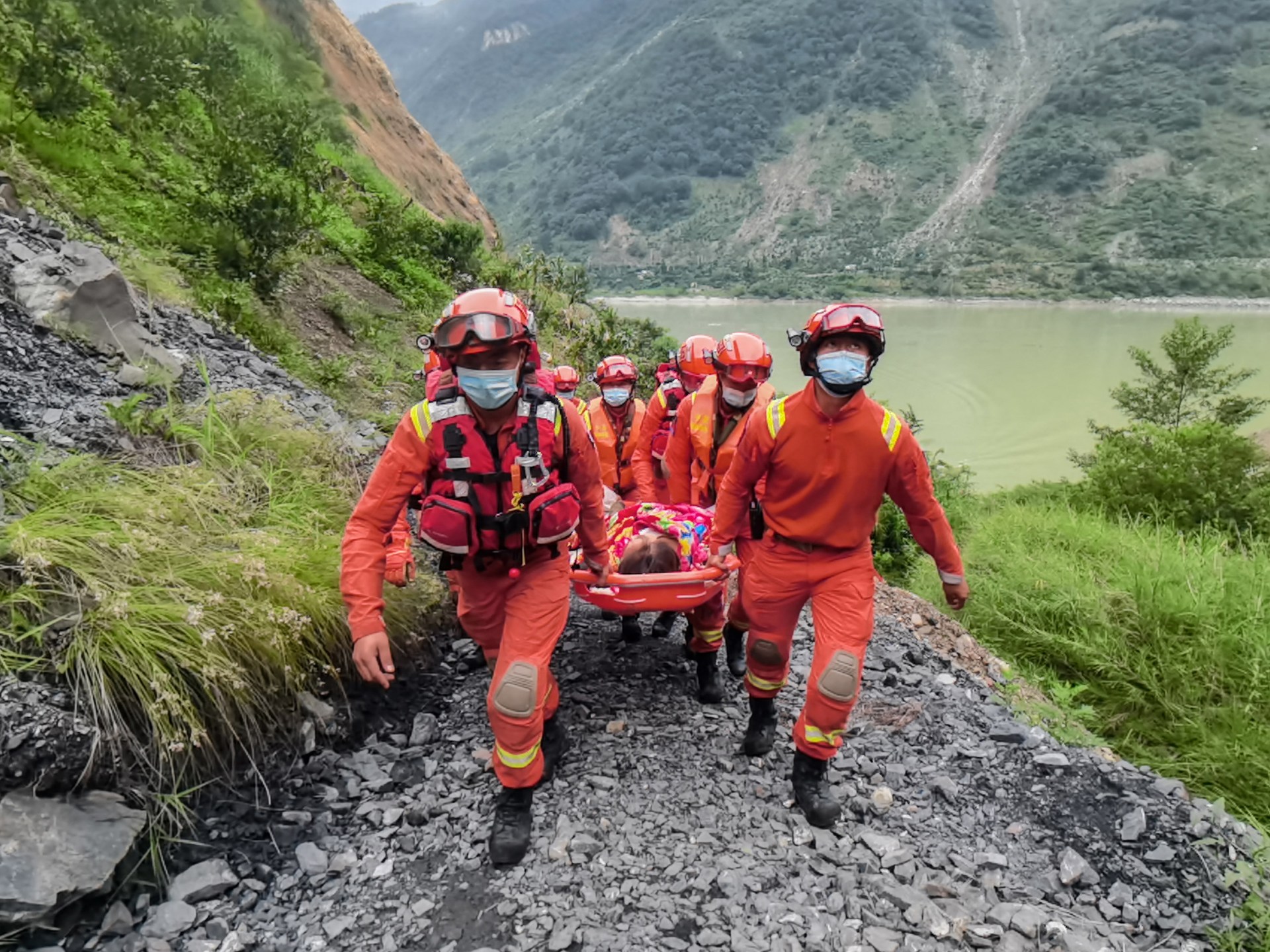 Rain and floods hamper earthquake rescue mission in China