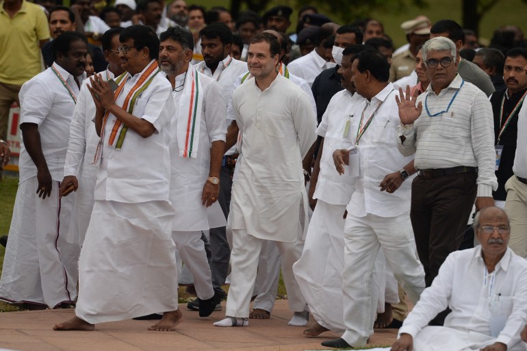 Congress party leader Rahul Gandhi (C) arrives to pay tribute at his father, slain former Indian prime minister Rajiv Gandhi's assassination memorial in Sriperumbudur on September 7, 2022, before starting his party's Kanyakumari to Kashmir rally. (Photo by Arun SANKAR / AFP)