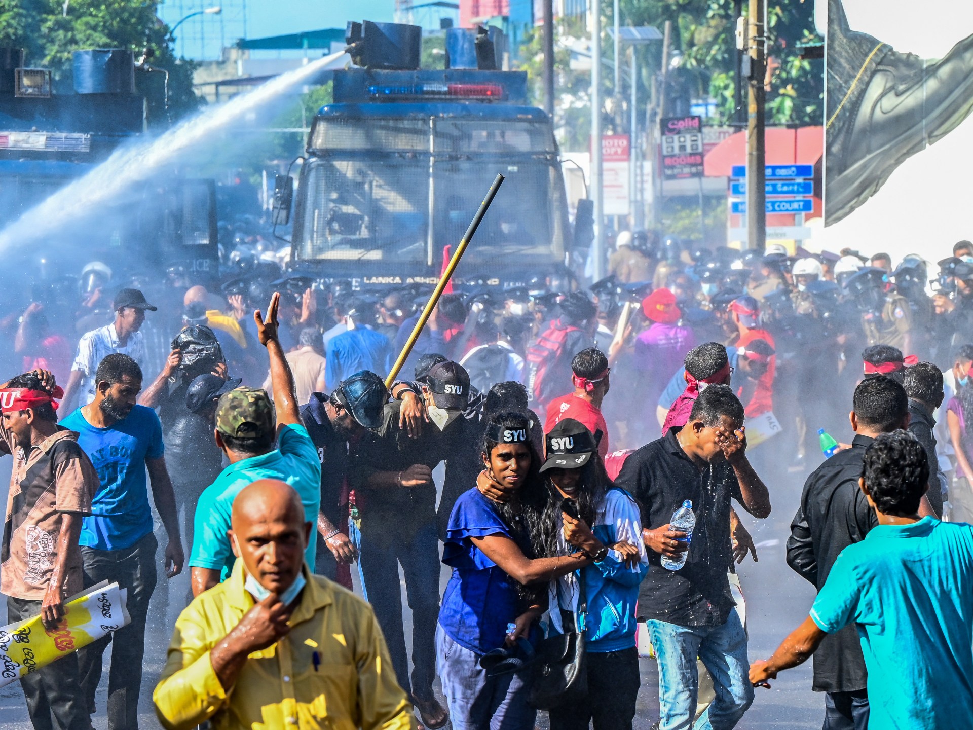 Photos: Sri Lankan police fire tear gas to disperse protesters