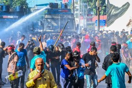 Police disperse anti-government demonstrators in the capital, Colombo. [Ishara S Kodikara/AFP]