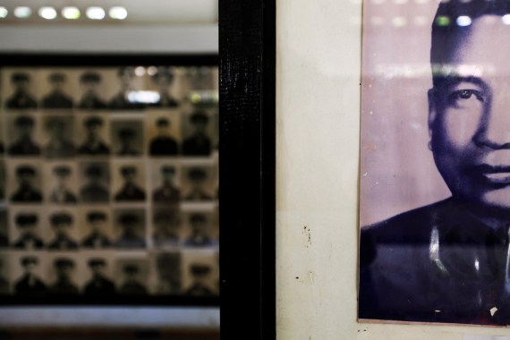 A portrait of of Khmer Rouge leader and "Brother Number One" Pol Pot is seen in front of pictures of his victims at the Tuol Sleng Genocide Museum in Phnom Penh, Cambodia.