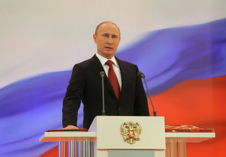 Vladimir Putin is sworn in as the new Russian president during a ceremony at the Kremlin in Moscow, May 7, 2012. Putin was sworn in as Russia's president in a glittering Kremlin ceremony on Monday, starting a six-year term in which he faces growing dissent, economic problems and bitter political rivalries. REUTERS/Vladimir Rodionov/RIA Novosti/Pool (RUSSIA - Tags: POLITICS) THIS IMAGE HAS BEEN SUPPLIED BY A THIRD PARTY. IT IS DISTRIBUTED, EXACTLY AS RECEIVED BY REUTERS, AS A SERVICE TO CLIENTS
